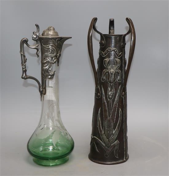 An Art Nouveau pewter mounted etched glass claret jug and a vase, tallest 36cm